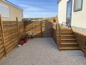 154LP Alhambra Park Home | Image of the fencing to the side of the park home