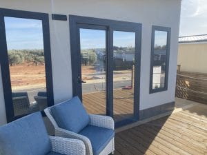 154LP Alhambra Park Home | Image of a chair on the front delcking