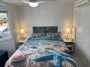 64LP Atlas Solitaire | Image of the bed in the master bedroom